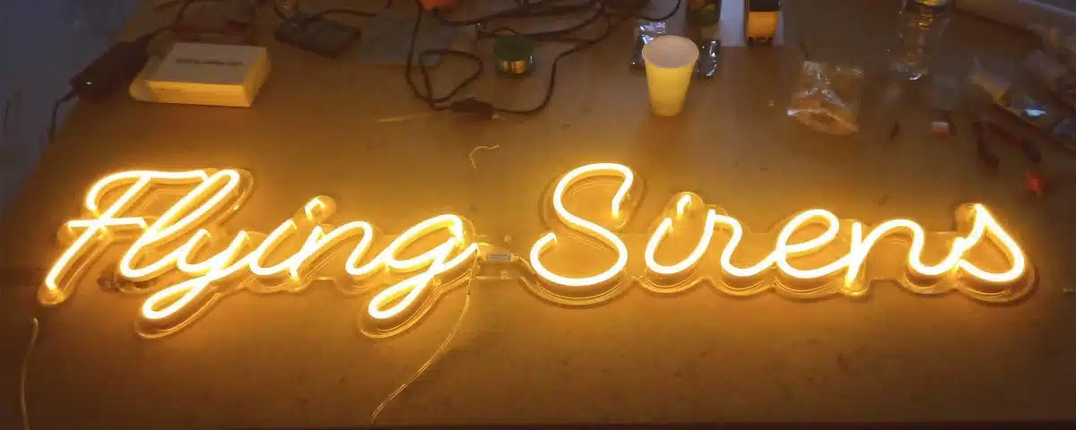 Flying Sirens Yellow Color LED Neon Sign